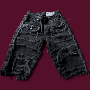 Evolution in style Boy’s Black Shorts size 12